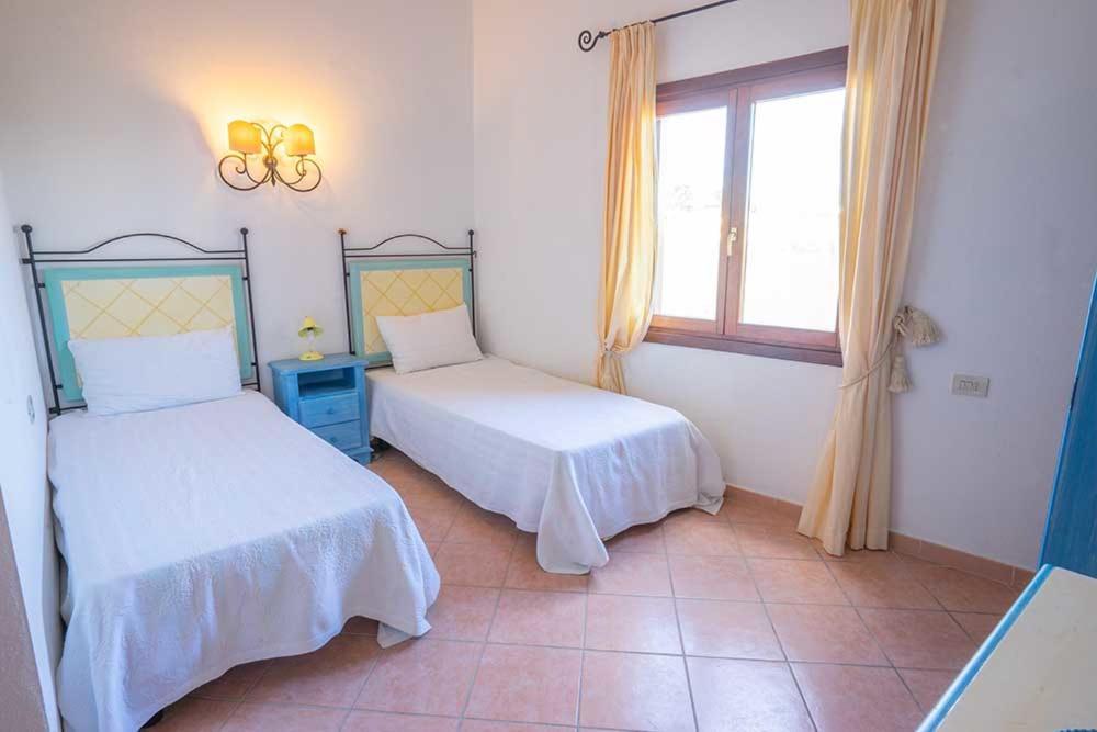 Residence Baia Sant Anna Con Piscina Tanaunella Eksteriør bilde